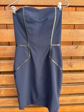 Yigal Azrouël Strapless Navy dress with lam leather piping. Brand new with tags